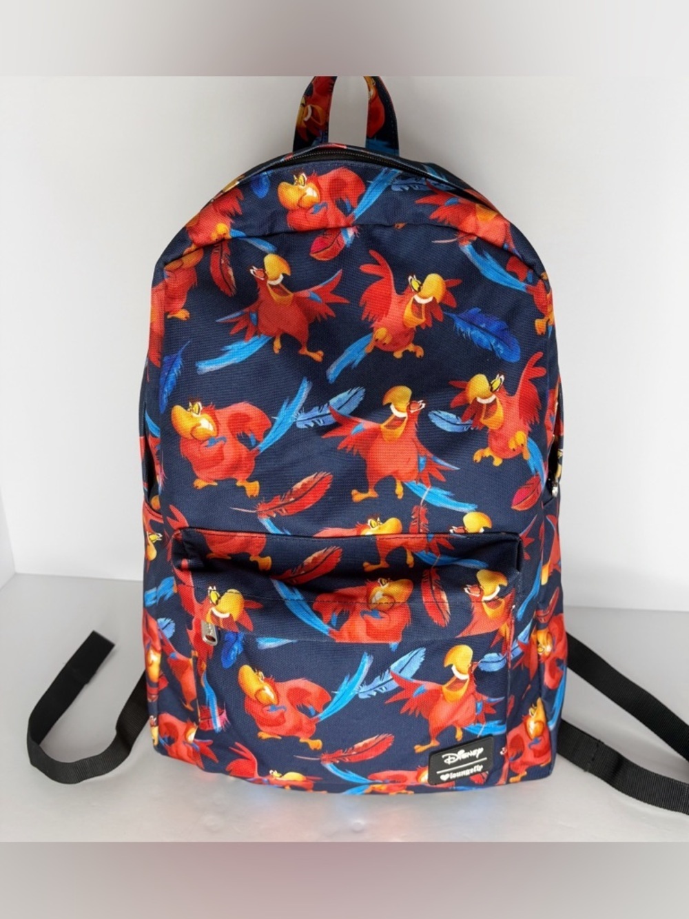 Loungefly Disney Aladdin Iago Bird Character All Over Print Backpack Blue Red
